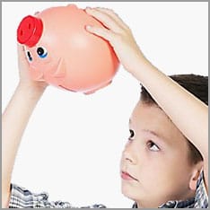 Boy with piggy bank