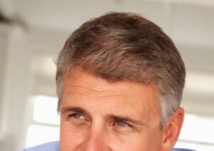 Man with grey mottled hair