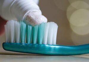 Toothpaste on toothbrush