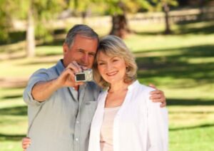 Grandma and grandpa take a photo of themselves