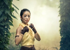 Confident woman in fighting position