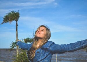 Woman happy on the beach