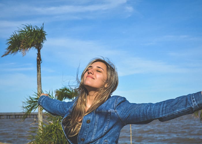 Woman happy on the beach