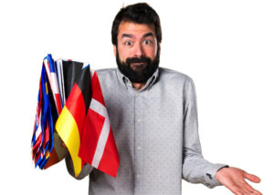 Mann mit Landesfahnen